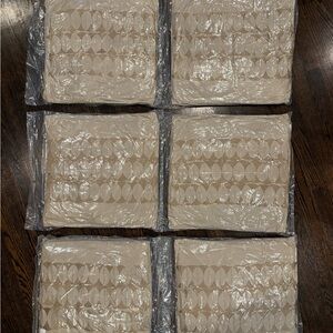 Set of Beige Patterned Cushions